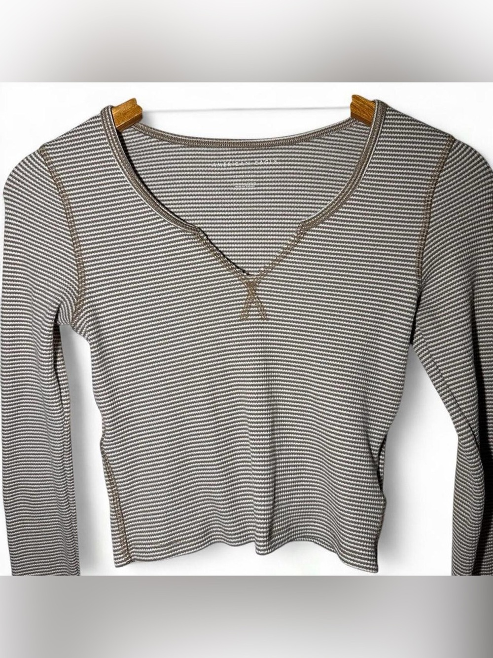 American Eagle brown + white striped long sleeve top.